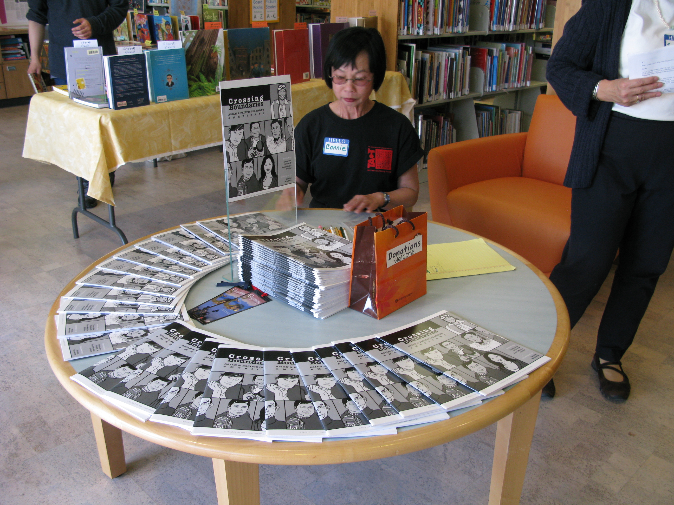 Adult at a pamphlet display
