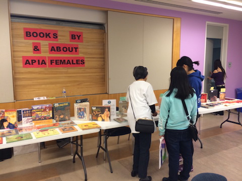 Adults at Books by & About APIA Women display